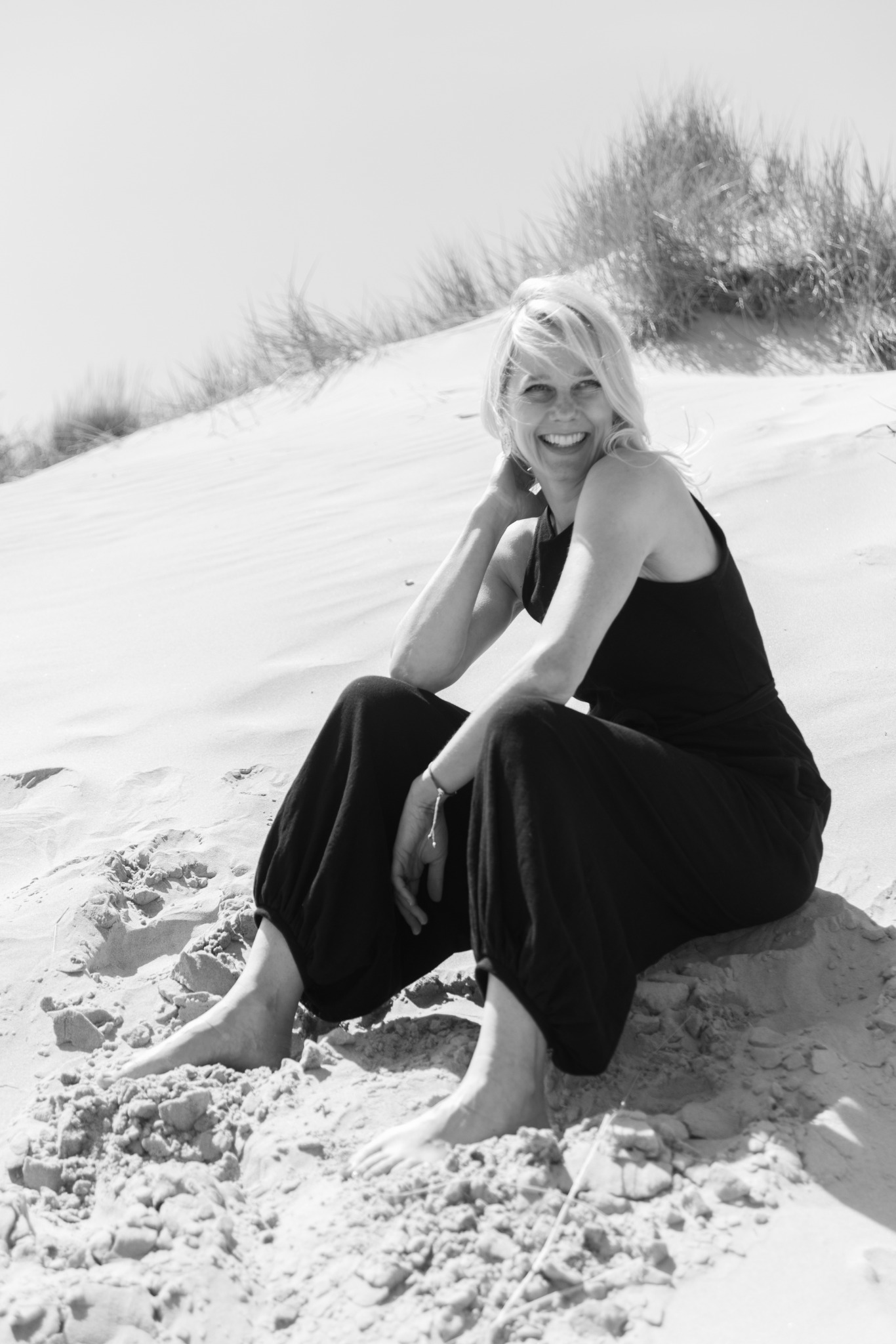 Relaxed beach founder portrait