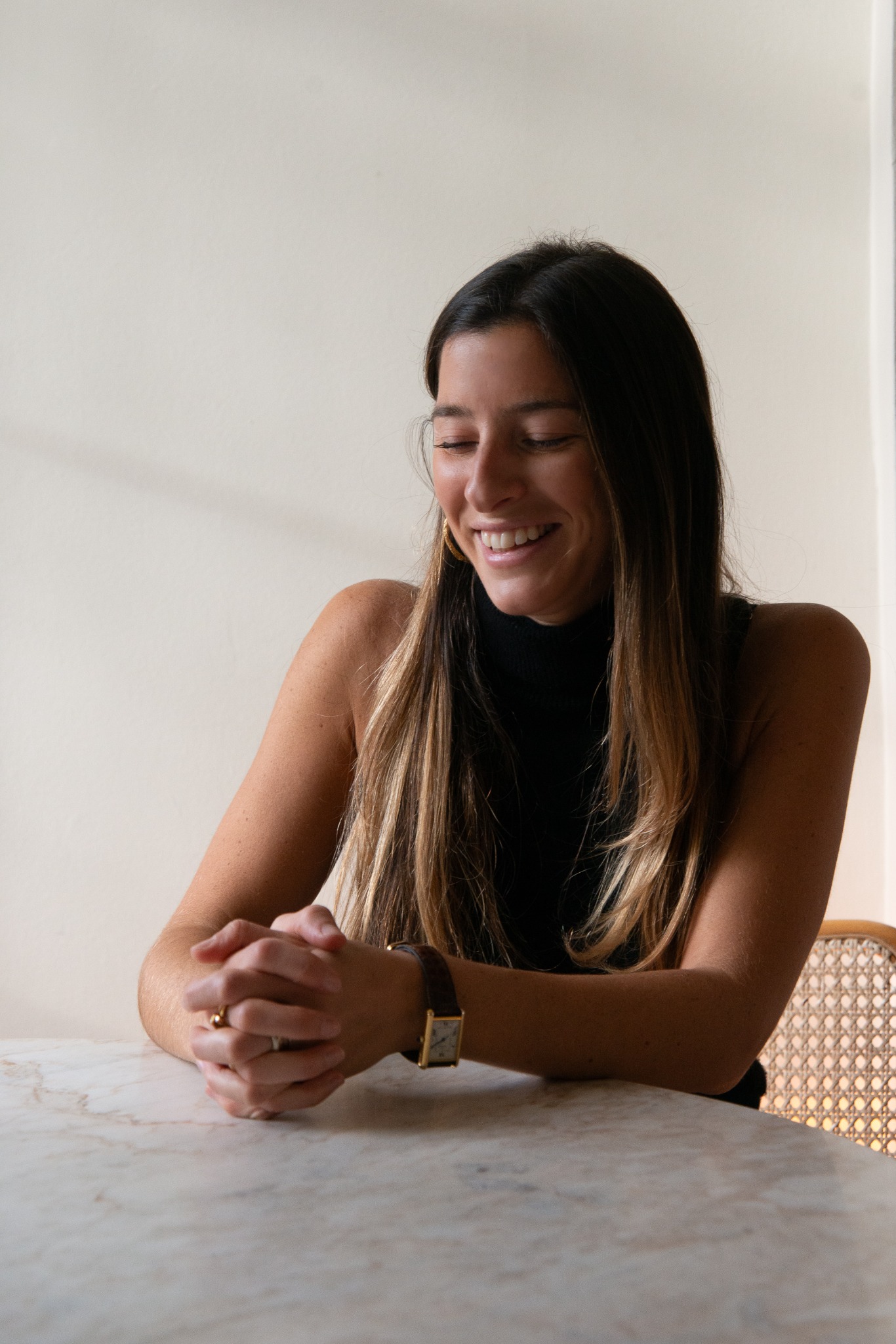 Relaxed portrait at a marble table